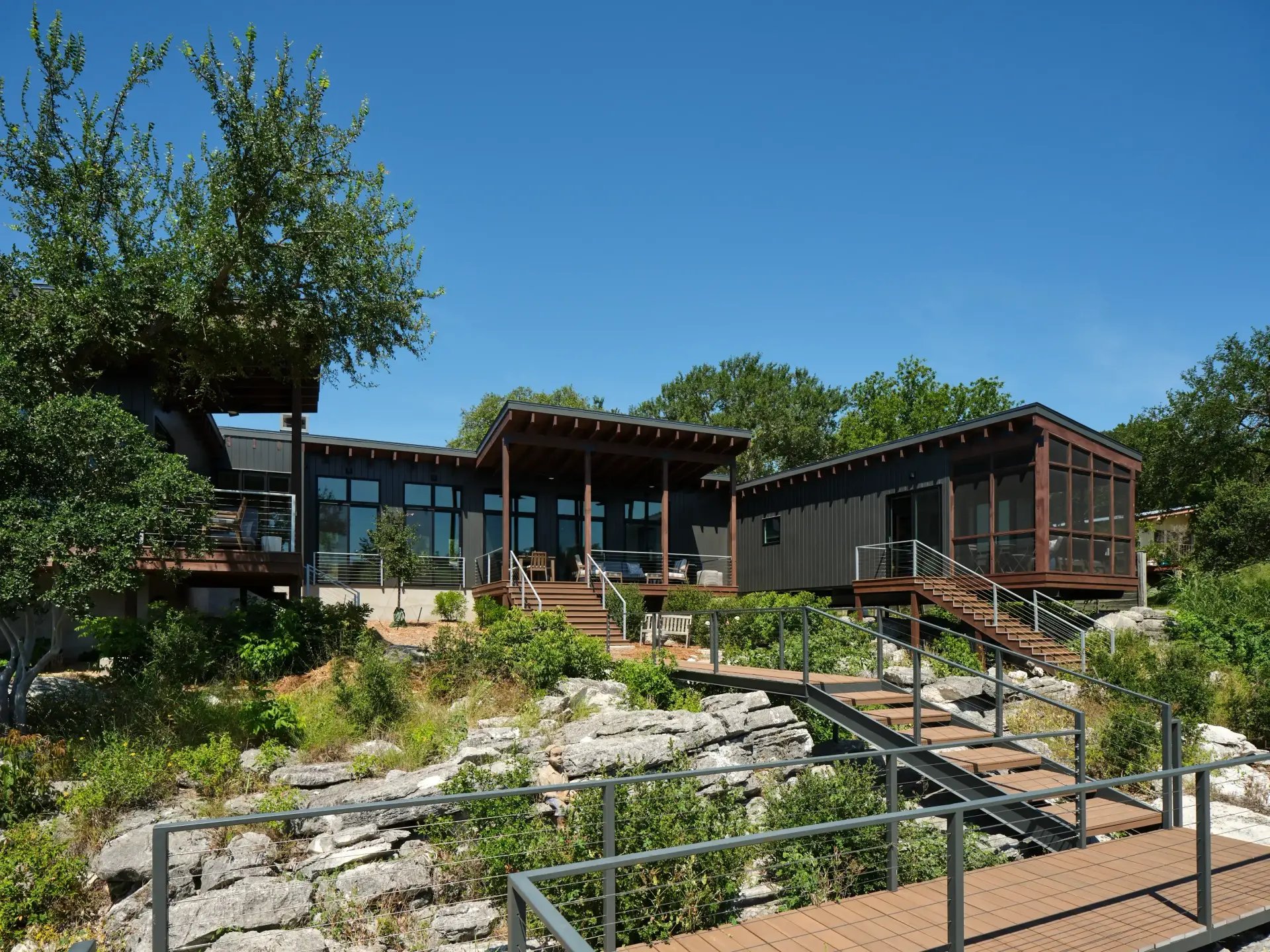 Elegant two-story custom home featuring stone and stucco exterior on Lake LBJ