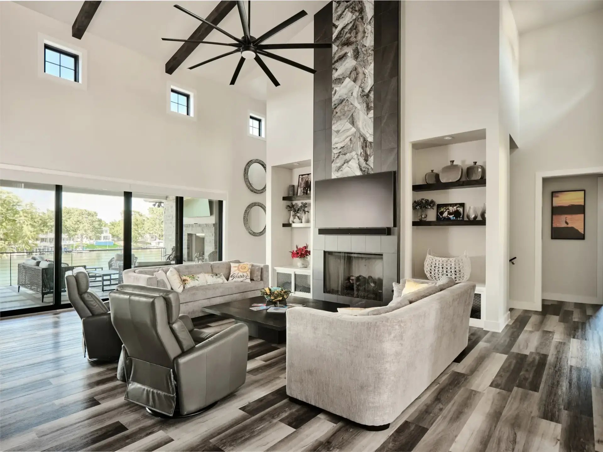 Luxurious Lake LBJ custom home exterior with stone and stucco facade showcasing Showcase Builders' craftsmanship